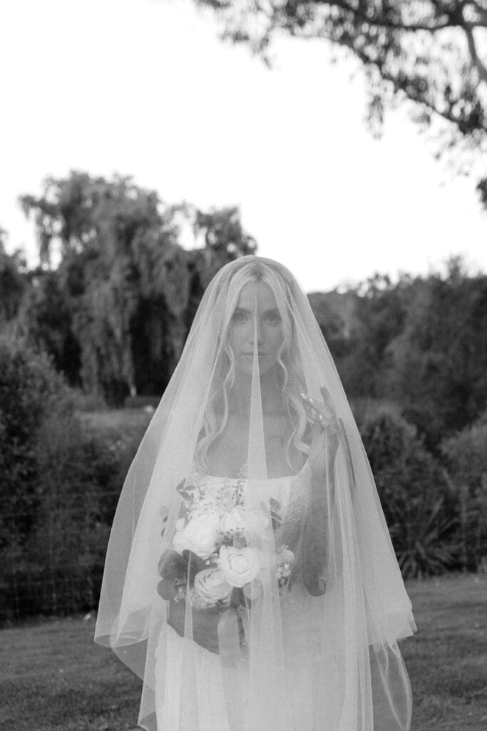 Black and white photo of a bride on her wedding day in Christchurch, New Zealand 